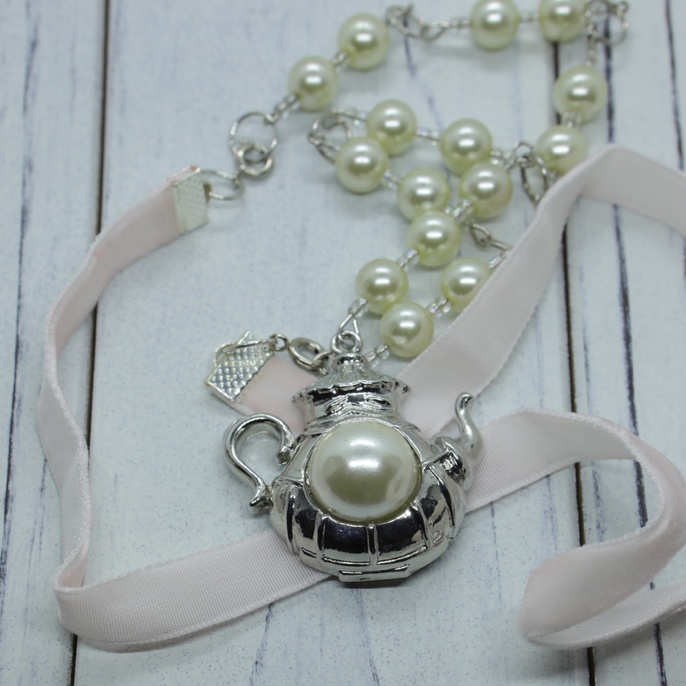 Pearls and tea themed pendant necklace.
